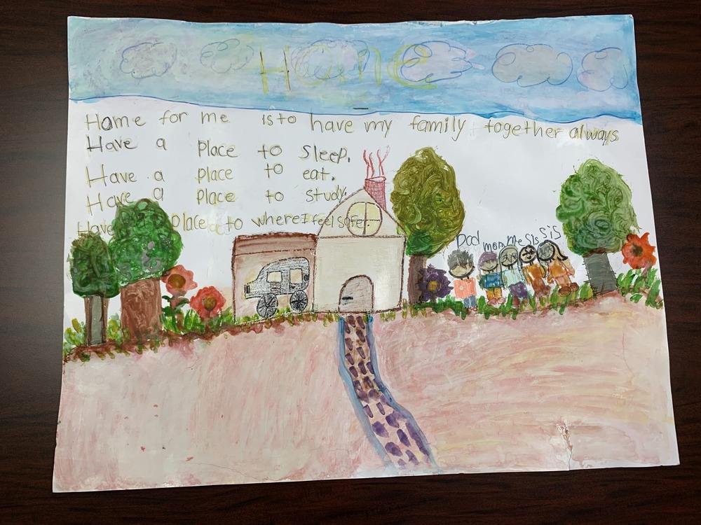 September What Home Means to Me 2022 Winner, artwork of a family standing outside of their home.