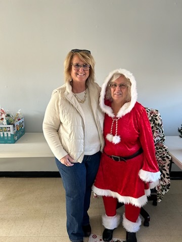 Mrs. Clause and another woman. 